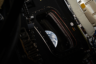 Earth seen from Artemis II after translunar injection burn