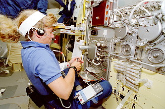 Davis onboard Space Shutlle