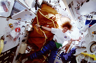 Helms onboard Space Shuttle